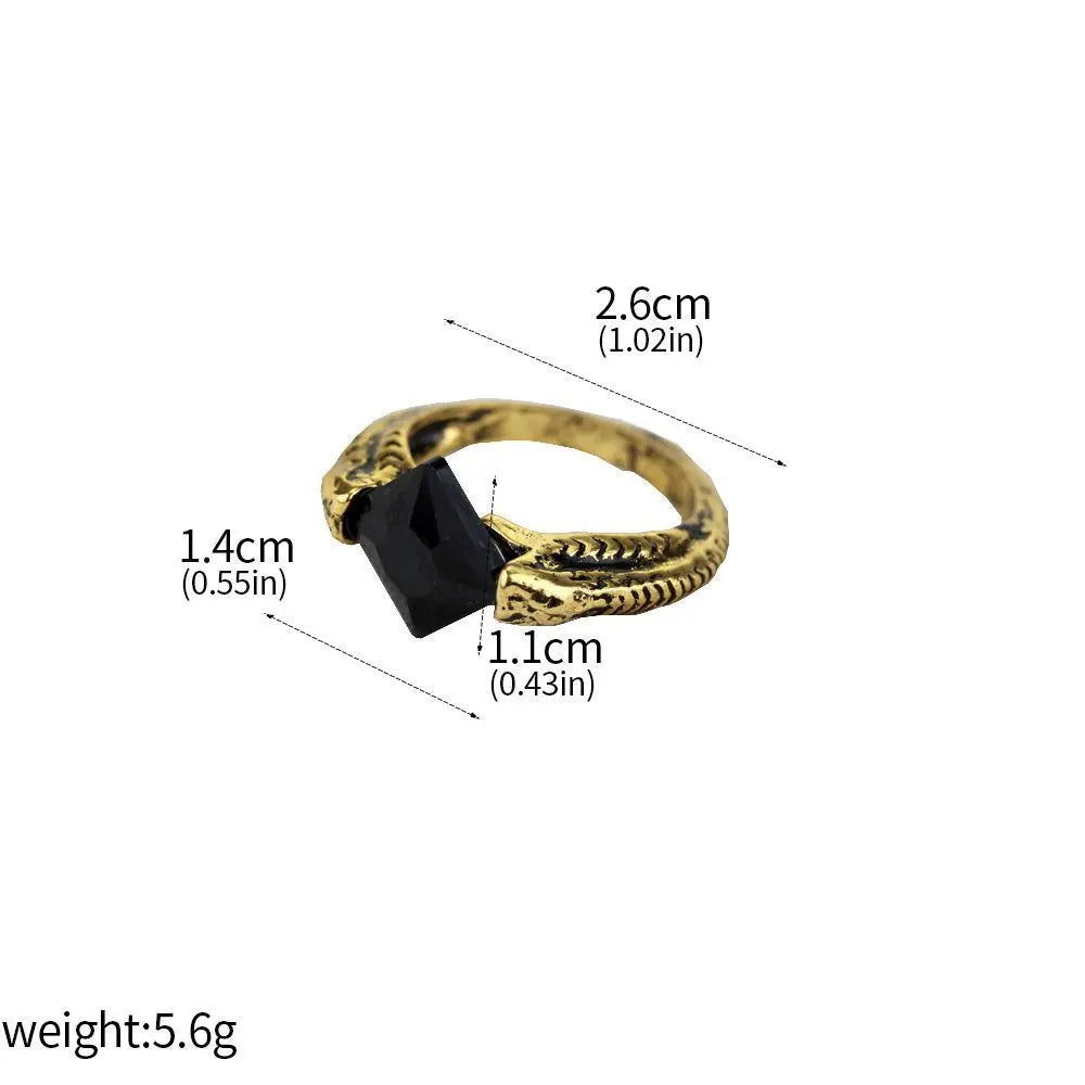 Product dimensions for the Marvolo Gaunt Horcrux ring showing the 2.6cm diameter and 1.4cm Resurrection Stone setting.