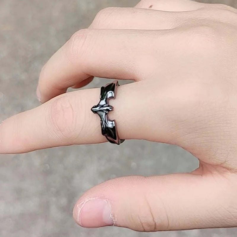 black batman symbol ring on hand model