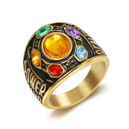 Ring with colorful gemstones and 'Avenger' text on a white background