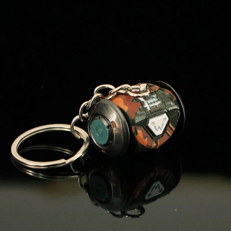 valorant raze boombot keychain on dark table