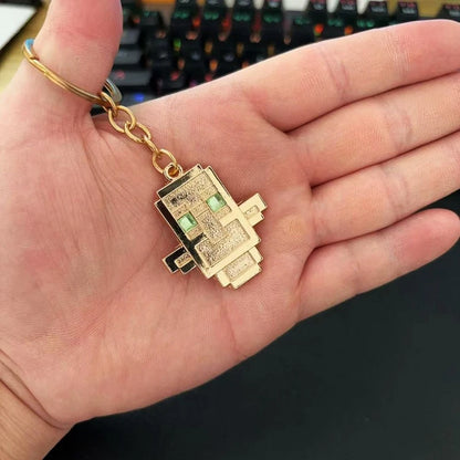 gold video game jewelry keychain from minecraft totem of undying